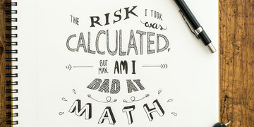 Kalkuliertes Risiko - aber ich bin schlecht in Mathe. Notizbuch, Stift und Zeichenkompass